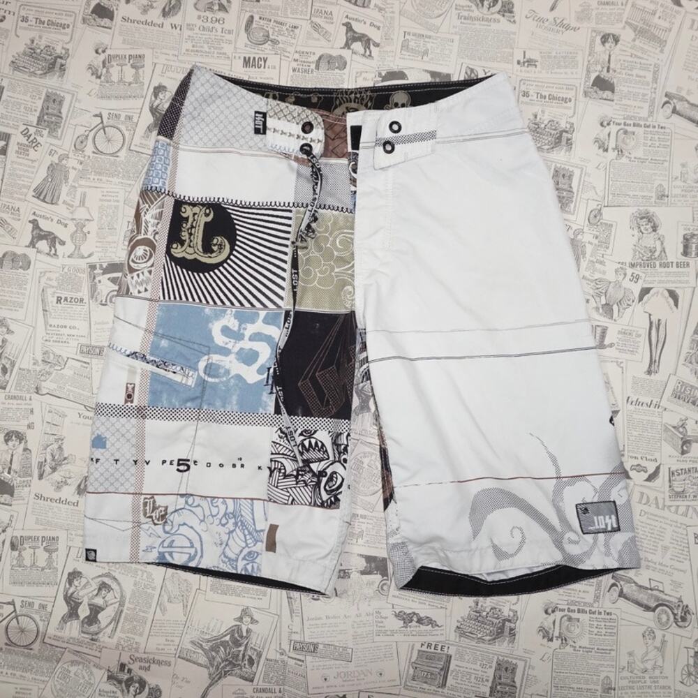 28 - Vintage Y2K lost brand swim trunks